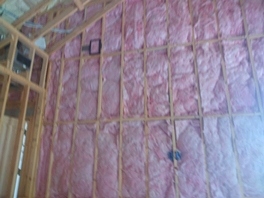 Insulation batts and spray foam